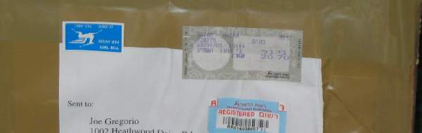 Picture of shipping box with non-US postage