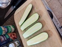 Cut zucchini in half length-wise.