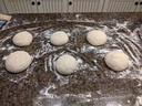 Turn out dough onto floured surface and cut into fist size balls with a dough knife. Fold each ball into itself until it forms a nice round ball. Let rise another 20 minutes.