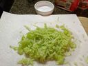 Sprinkle with salt and wrap the shredded cucumber in paper towel.